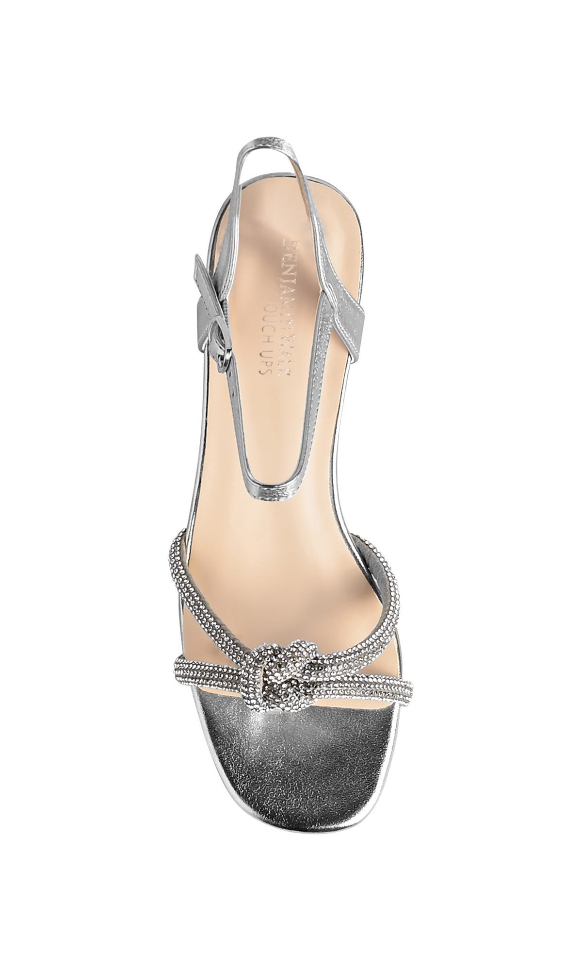 The Talulah Silver Prom Shoes: Touch Ups 4776 feature crystal-encrusted straps, a decorative knot, radiant rhinestones, and a low kitten heel—ideal for prom or any special occasion.